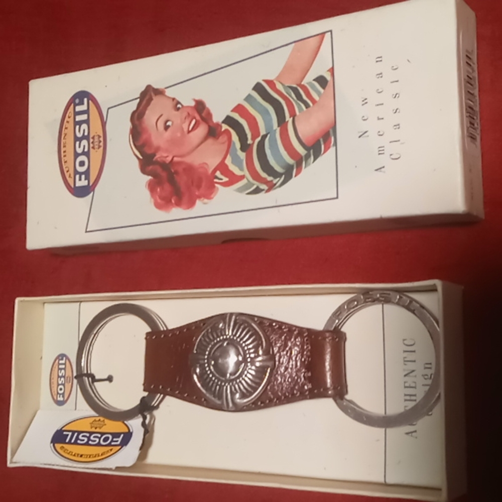Fossil genuine leather snap key chain.